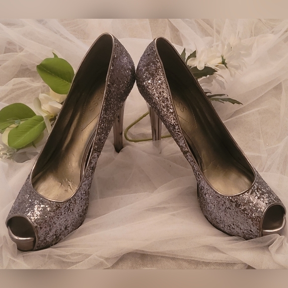 Guess Shoes - 4/$25  GUESS Silver Glitter Heels Used